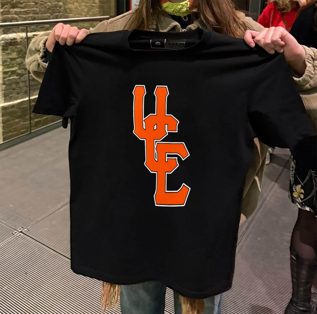 Orange UC Interlocking Letters Varsity Sports Logo shirt