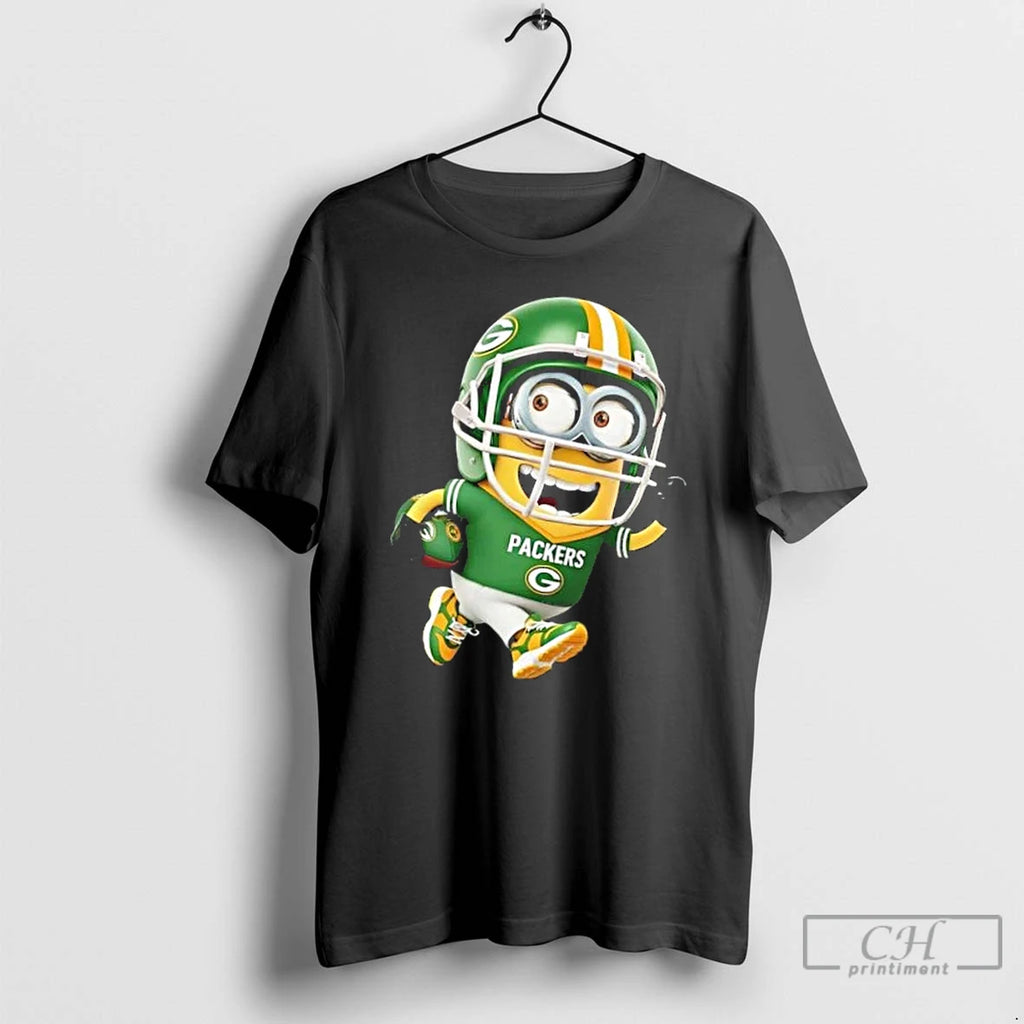 Premium Minions Is Holding A Ball And Smiling At Green Bay Packers Fans T Shirts