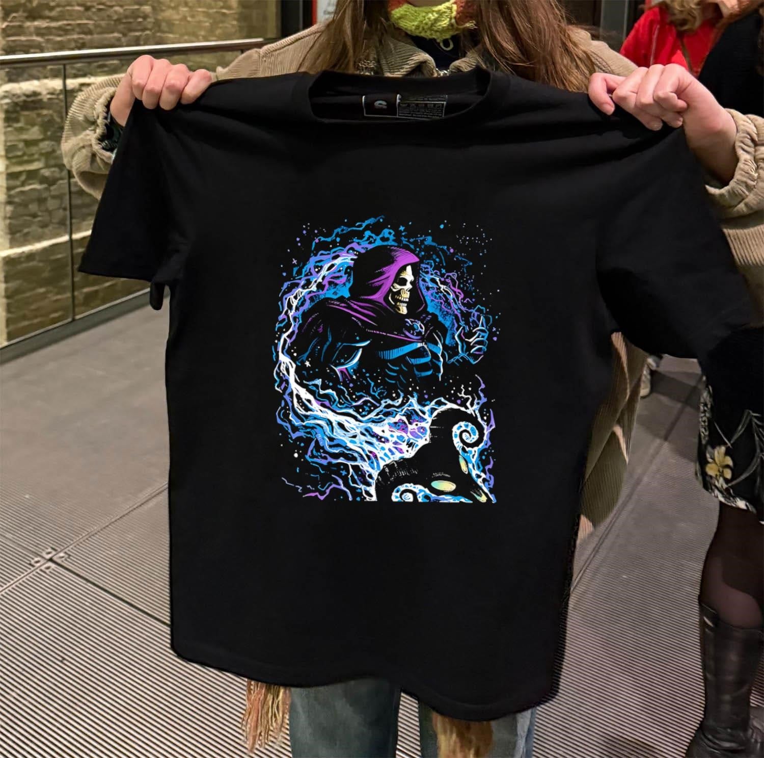 Skeletor Masters of the Universe purple hood magic lightning shirt