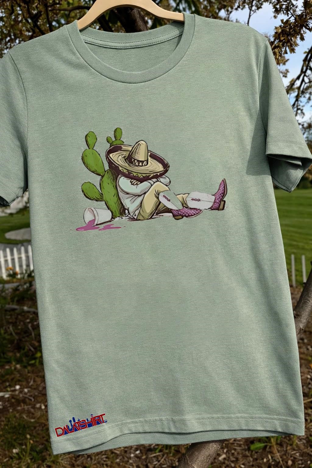Sleeping Mexican man in sombrero by cactus with drink shirt