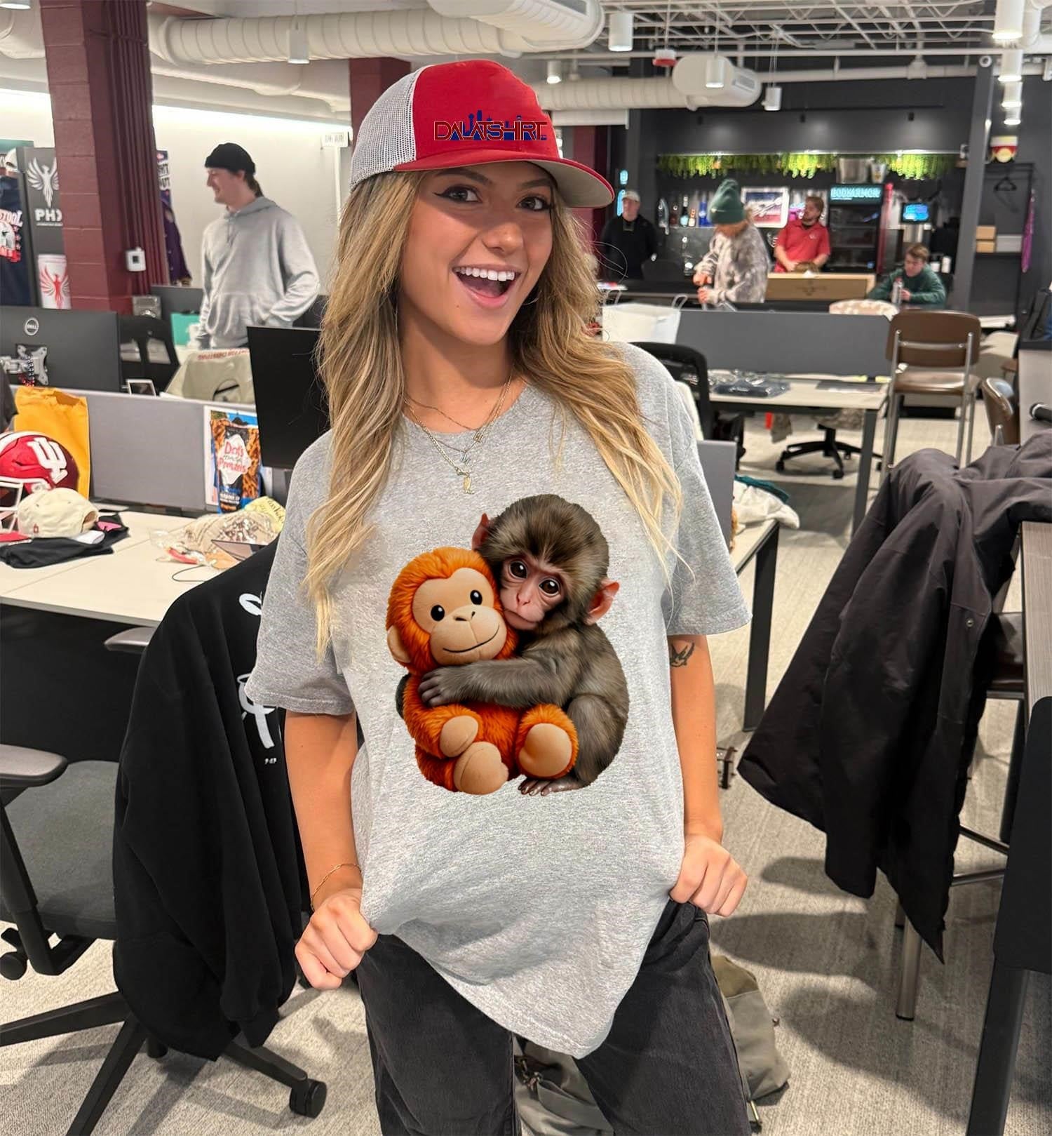 Small Brown Monkey Hugging Orange Stuffed Toy Animal shirt