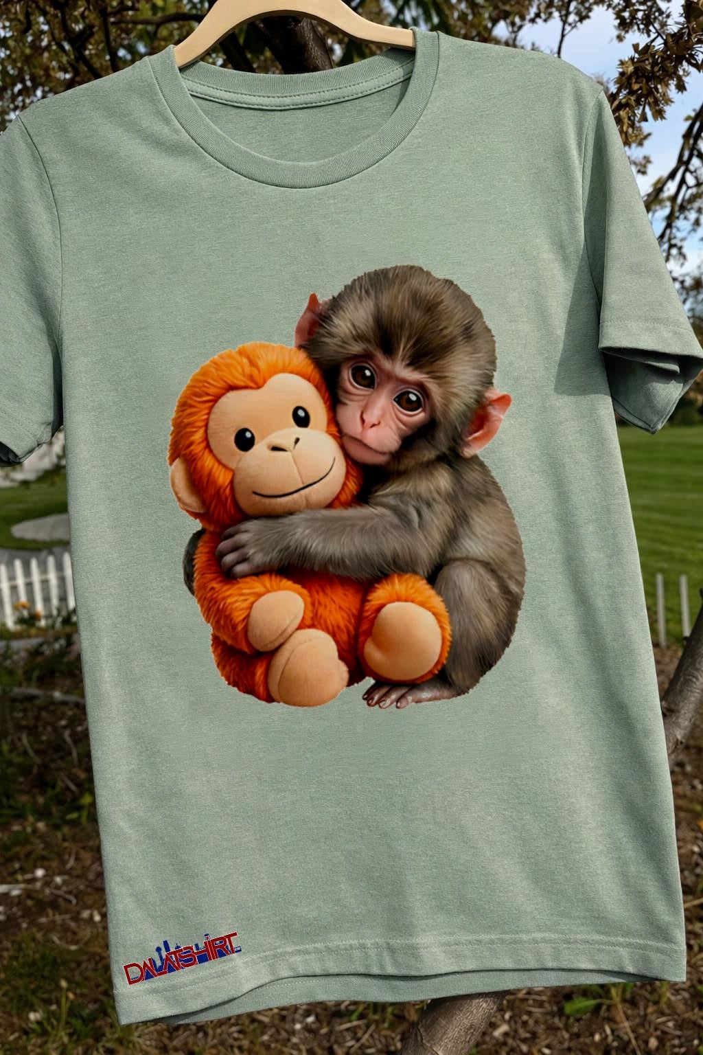 Small Brown Monkey Hugging Orange Stuffed Toy Animal shirt