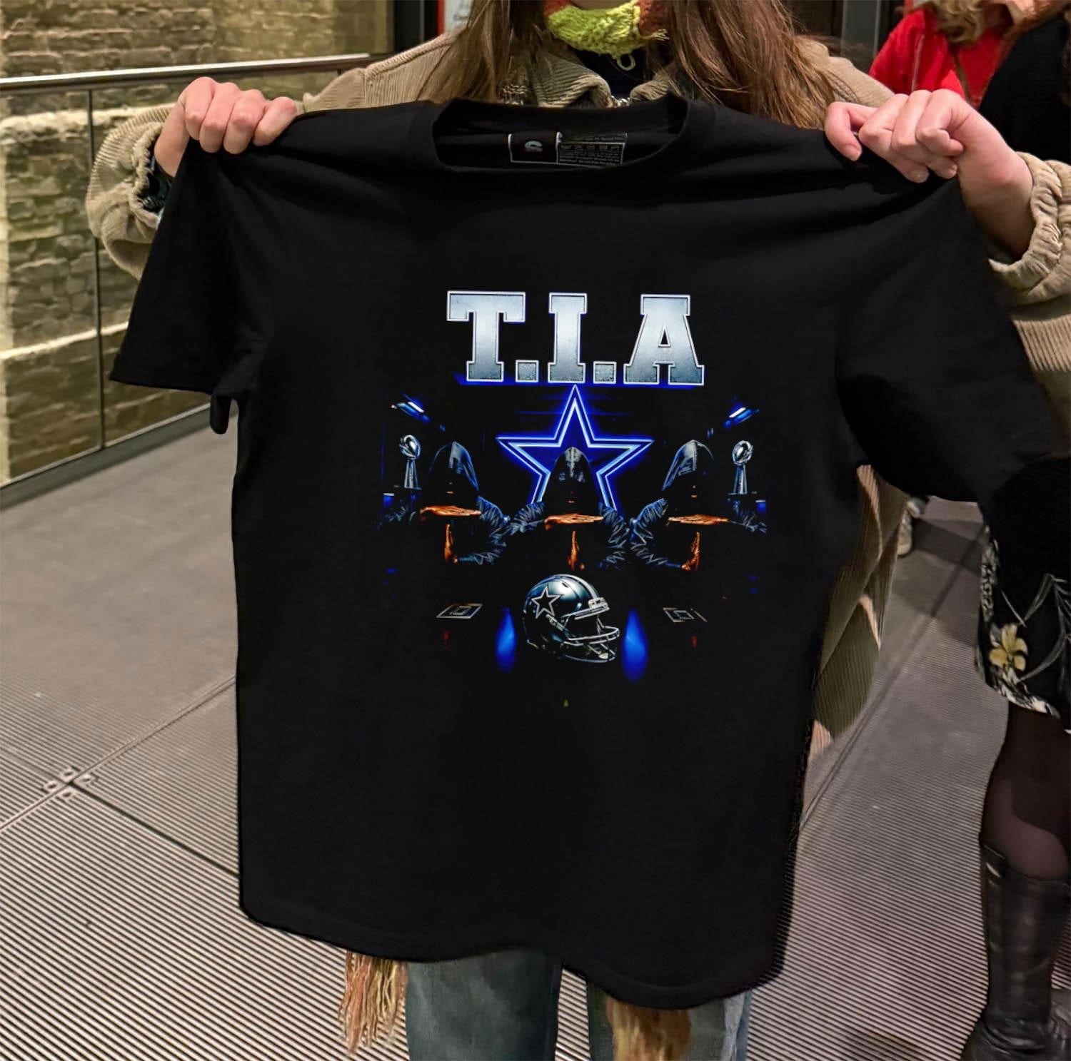 T.I.A. Dallas Cowboys Three Figures In Hoods Football Helmet shirt