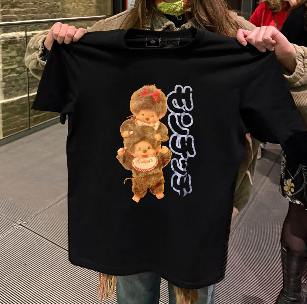Two Monchhichi monkeys sitting on shoulders bib vintage shirt
