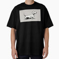 Dachshund stands on a plain surface by anytka