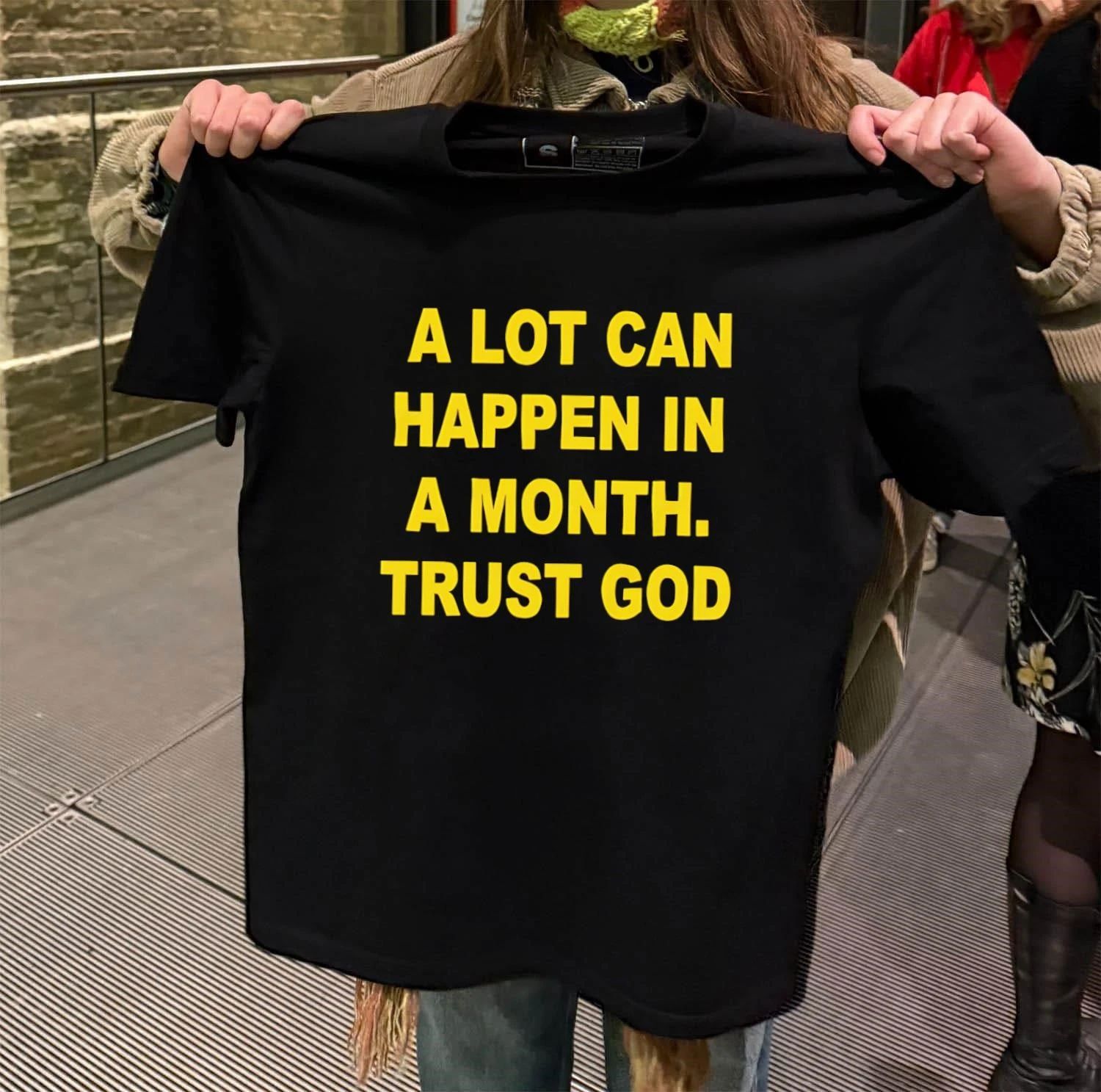 A lot can happen in a month trust god shirt