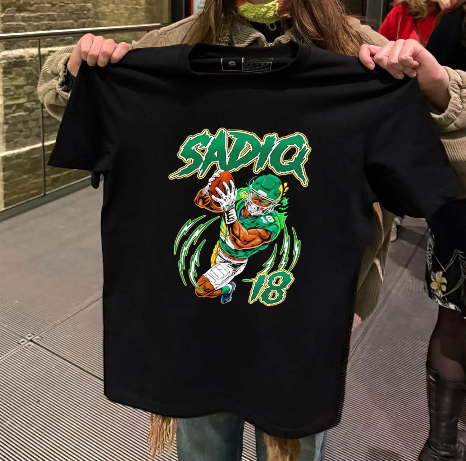 Sadiq 18 American Football Player Catching Ball Neon Green Lightning shirt