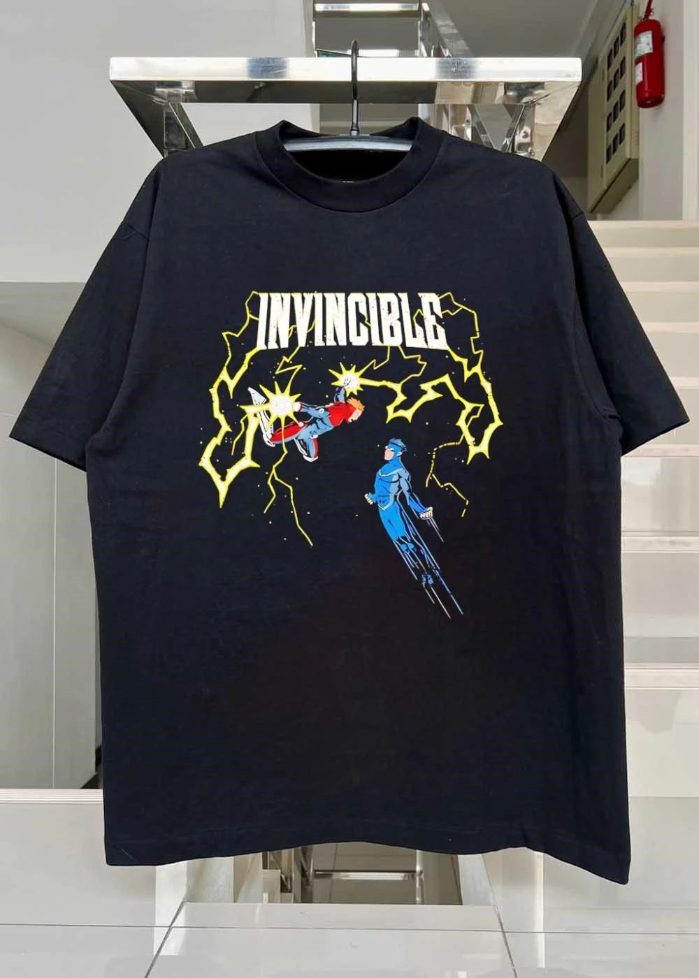 Invincible vs Powerplex shirt